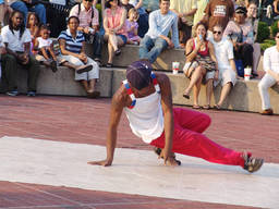 A breackdancer performing in the street