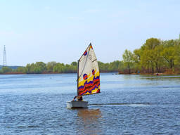 A kid having fun on his boat!