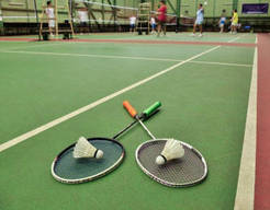 A kid playing badminton