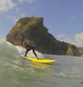 7 Year old Will surfing at Piha Beach
