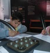 Practise writing with a quill!