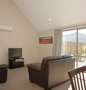 Spacious lounge opens out to patio