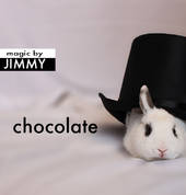 Chocolate appears from under Jimmy's Magic Hat
