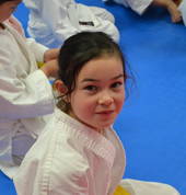 A young student waiting for her turn to shine