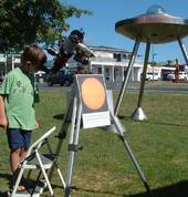 Safely viewing the Sun through a solar telescope.