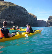 Sea-kayaking safari looking outside the bay.