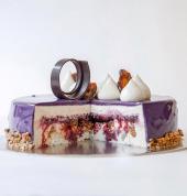 Violeta birthday cake is made of dulce de leche mousse, blackberry compote, almond hazelnut dacquoise, chewy malted figs. Serves 5-8.
