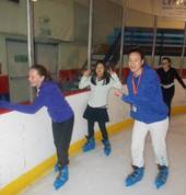 Slipping and sliding on the ice.  Youth programme holiday activity.