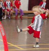 Little Kickers - boy kicking goal