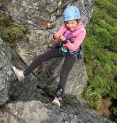 Linn 8 years abseiling at Otepatotu, Akaroa