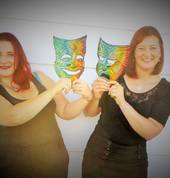 Miss Antz and Miss Mon with the drama masks